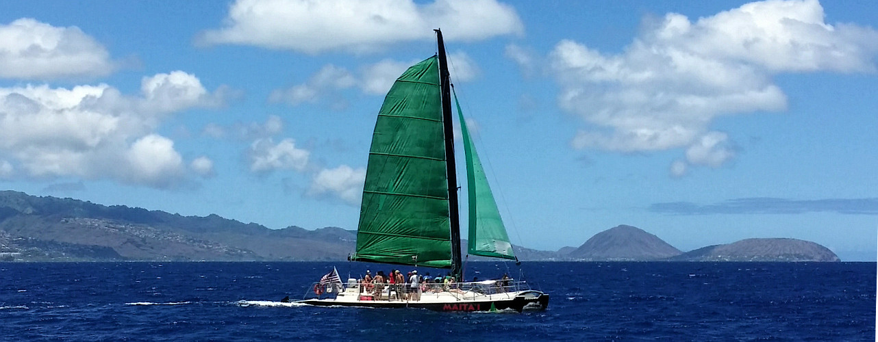 Maita‘i Catamaran sailing along Oahu’s coast
